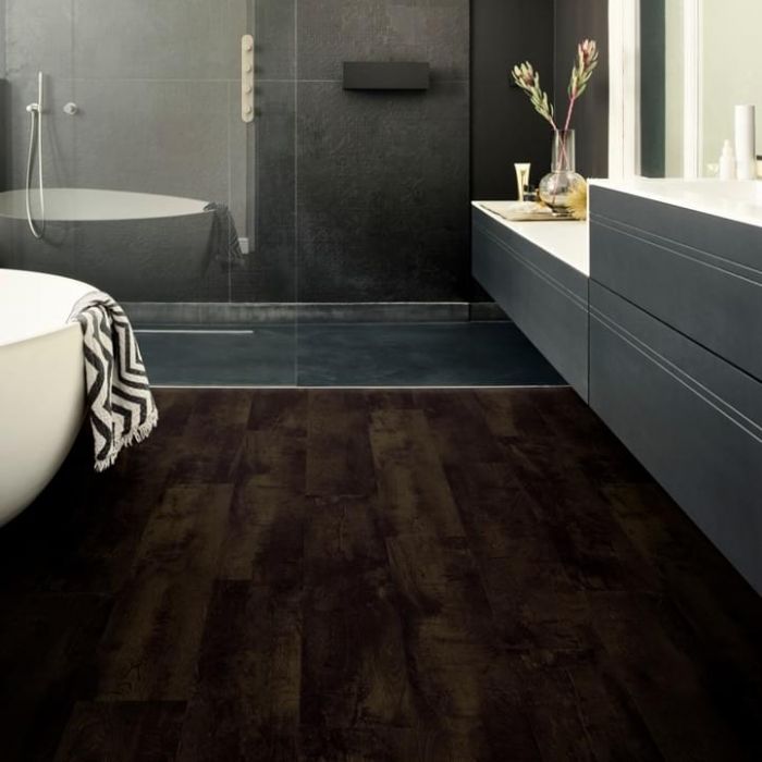 dark brown wood effect rigid click lvt flooring in bathroom with grey units and tiles country oak 54991