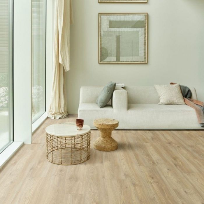 medium oak design rigid click vinyl flooring planks for a living room with cream walls and large windows sierra oak 58268