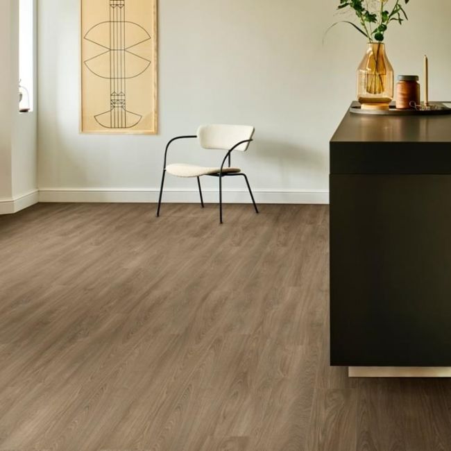 brown oak wood effect click lvt with white walls and black worktop moduleo layred laurel oak 51864